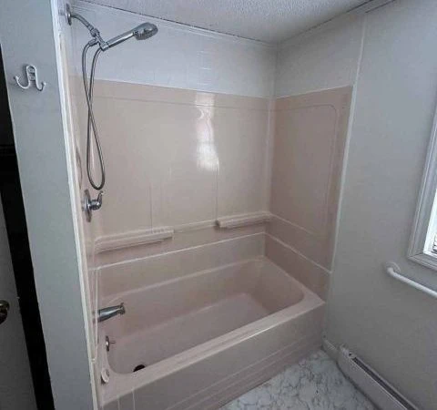 Bathtub replacement in Londonderry NH with new walk-in shower by Bath Flip