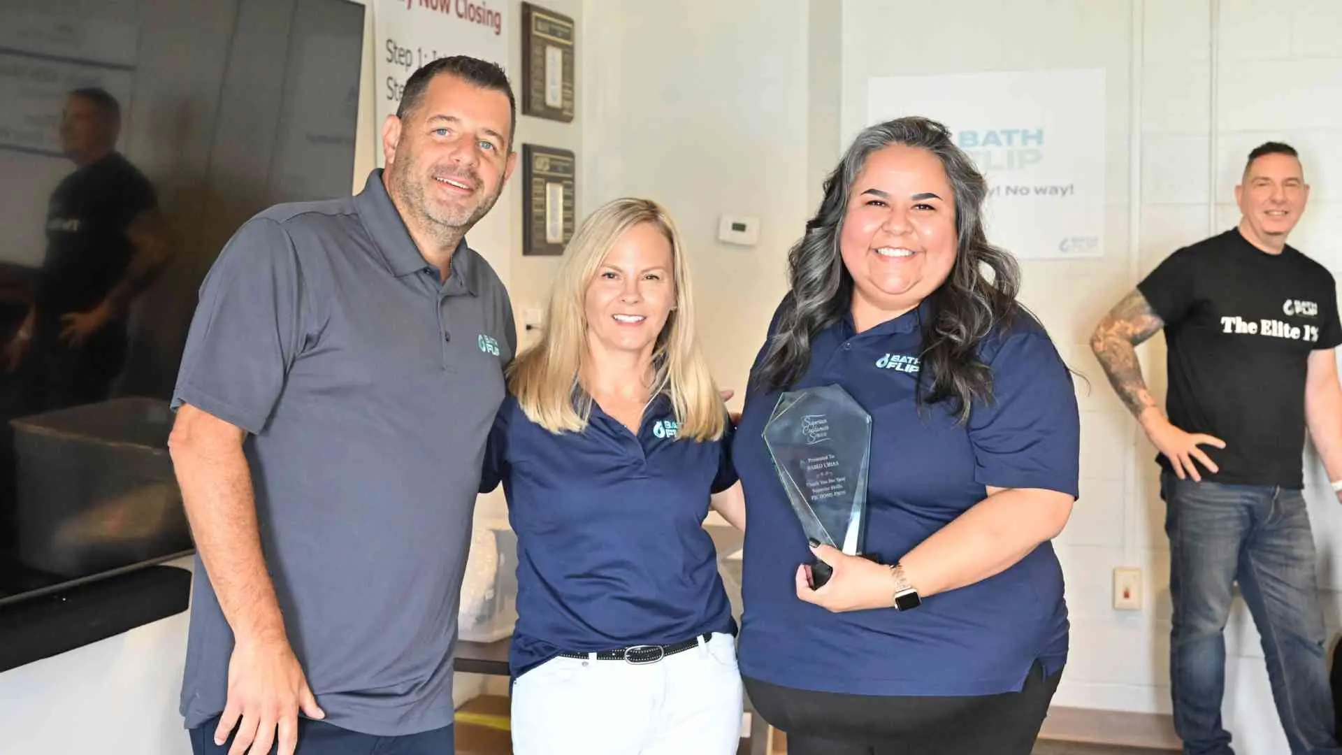 team accepting award