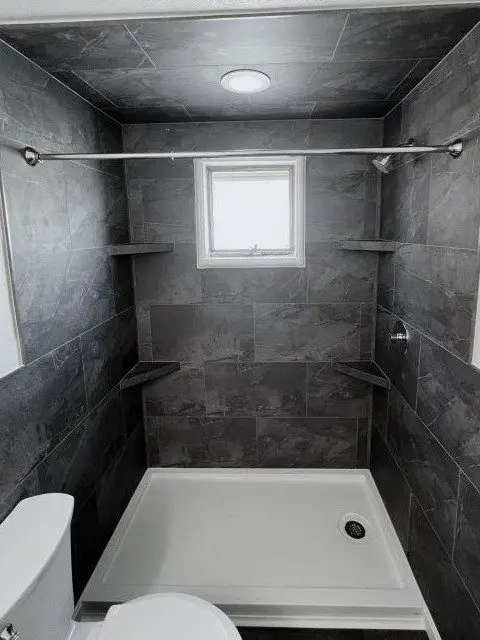 Beautifully remodeled bathroom showcasing a luxurious in-home spa transformation.