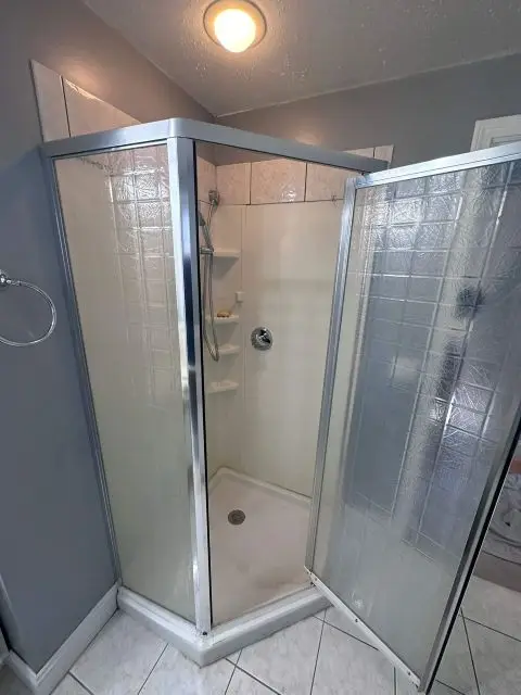 Before image of a bathroom needing renovation to enhance its appeal.