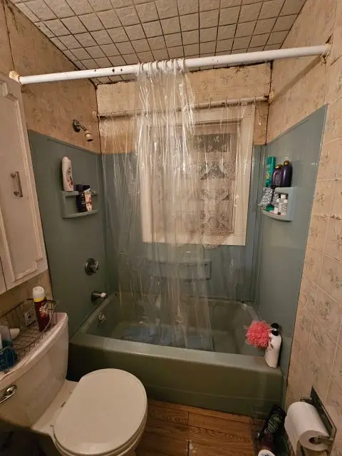 Before image of a dated bathroom awaiting a stylish upgrade.