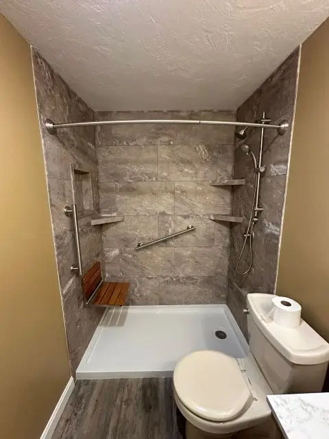 After image revealing a chic and modern bathroom remodel with elegant design.