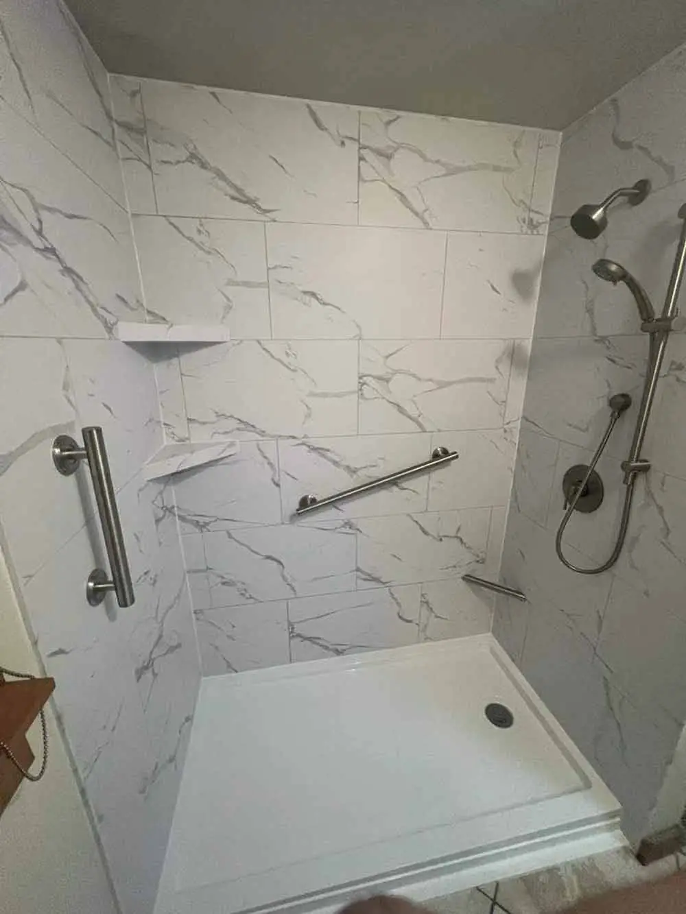 Stylish grab bar installed in a modern bathroom for safety and convenience.