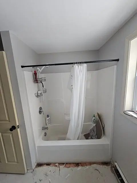 Before image showing a dated bathroom ready for a stunning remodel transformation.